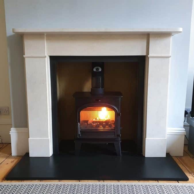 Limestone Flat Victorian Mantelpiece with slips header and stove